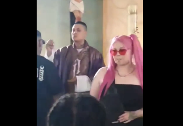 Rapper distribui cigarros de maconha em gravação de clipe em igreja | Reprodução