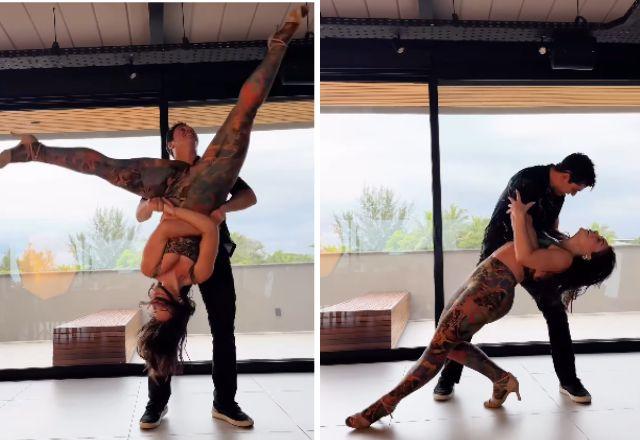 Print do vídeo em que Paolla Oliveira e Leandro Azevedo dançam salsa juntos.