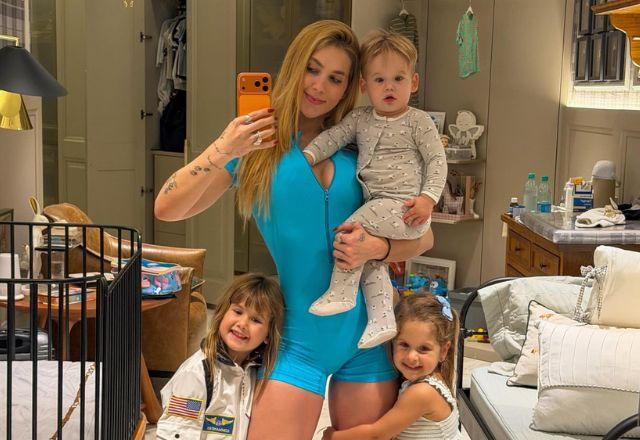 Virginia e os filhos em foto