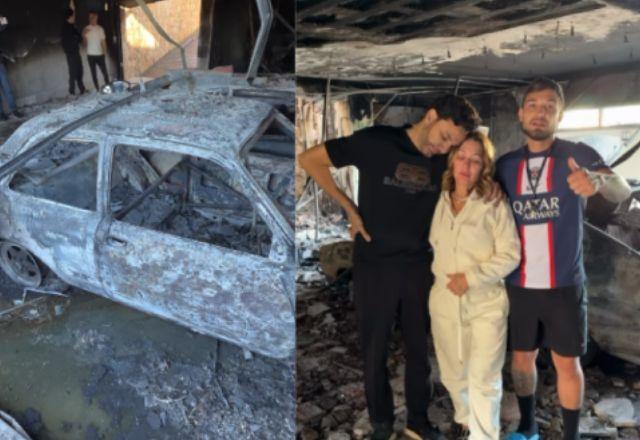 MC Gui com os pais em meio a destroços deixados pelo incêndio