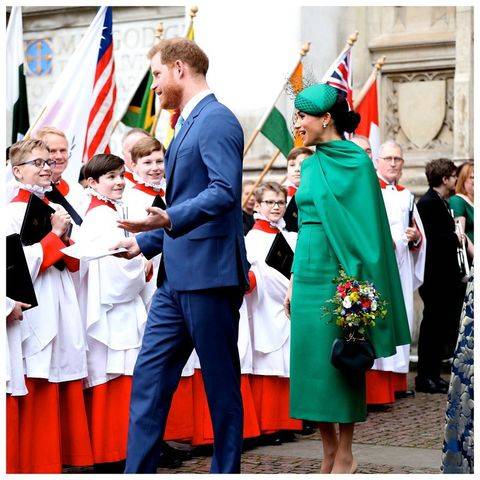Meghan Markle e Harry em um compromisso com a família real