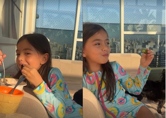 Zoe comendo pepino com sorvete